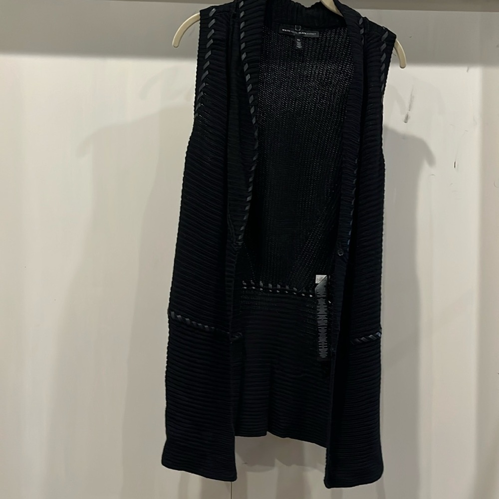 White House black market sleeveless sweater.